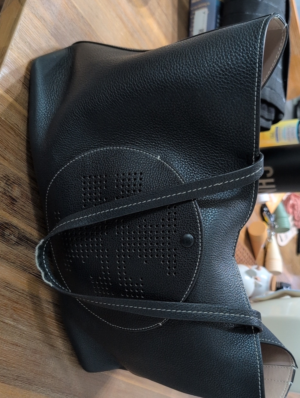 Black Leather Tote Bag with Perforated Detail.